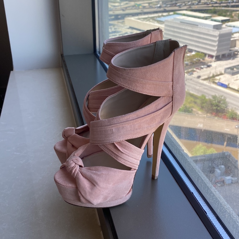 Pink peep toe heels. Never worn.